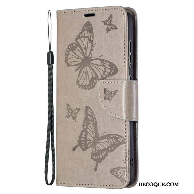 Etui Folio do Samsung Galaxy S21 FE Motyle W Locie Z Smyczą