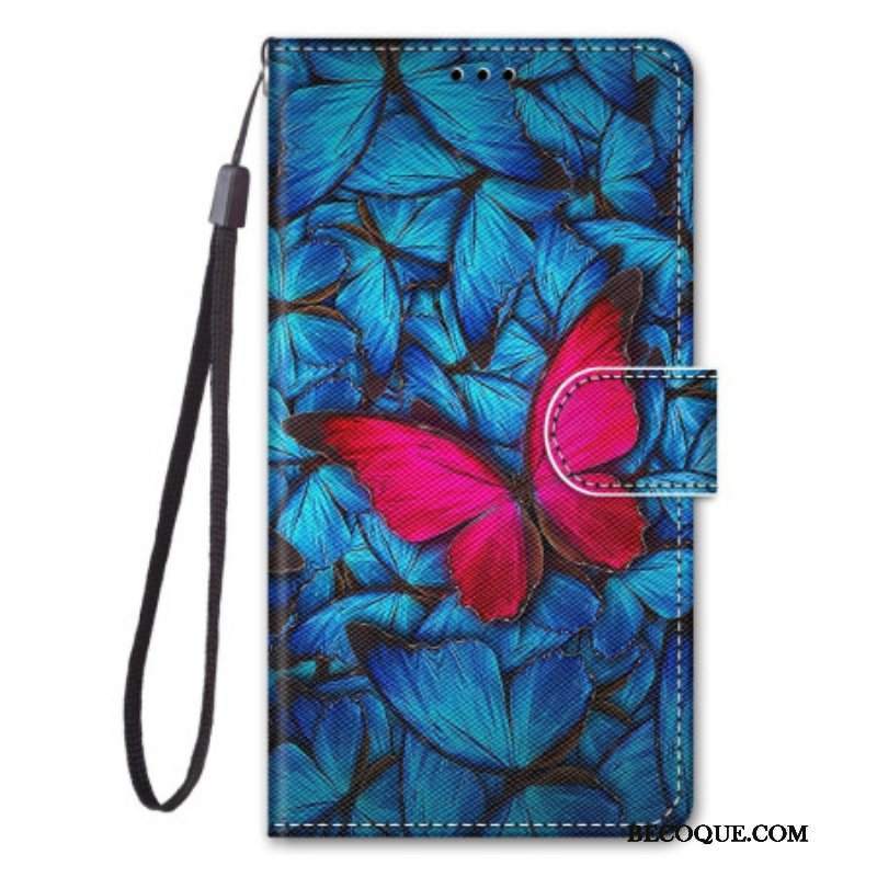 Etui Folio do Samsung Galaxy S23 Ultra 5G Czerwony Motyl Niebieskim Tle