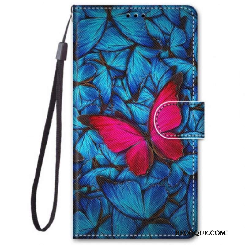 Etui Folio do Xiaomi Redmi Note 11 Pro Plus 5G Czerwony Motyl Niebieskim Tle